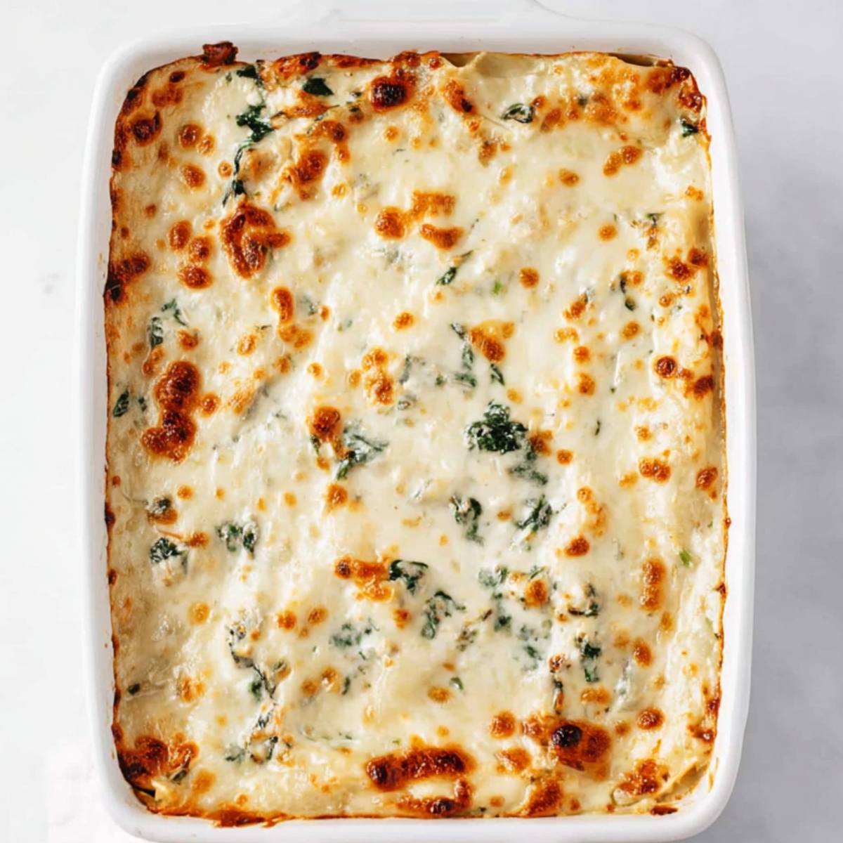 Bake Until Bubbly Slide the dish into your preheated oven and bake for 38 to 42 minutes. You'll know it's ready when the sauce is bubbling around the edges and everything looks hot and melty.