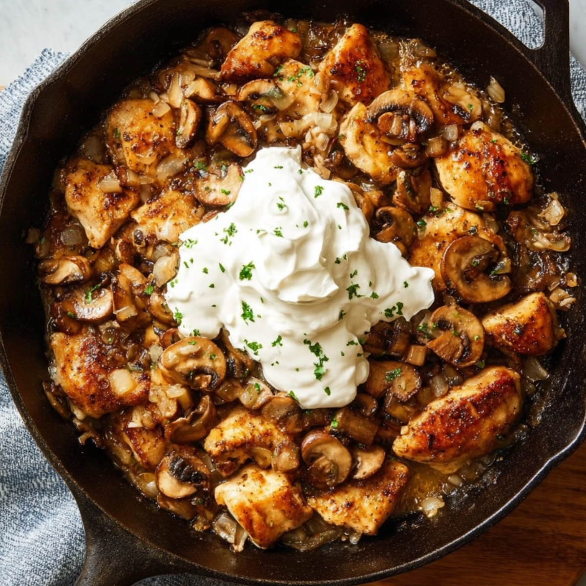 Turn the heat to low and stir in the sour cream. Let it heat through for about a minute, but don't let it bubble too much or it might curdle. Taste and add more salt and pepper if you'd like.