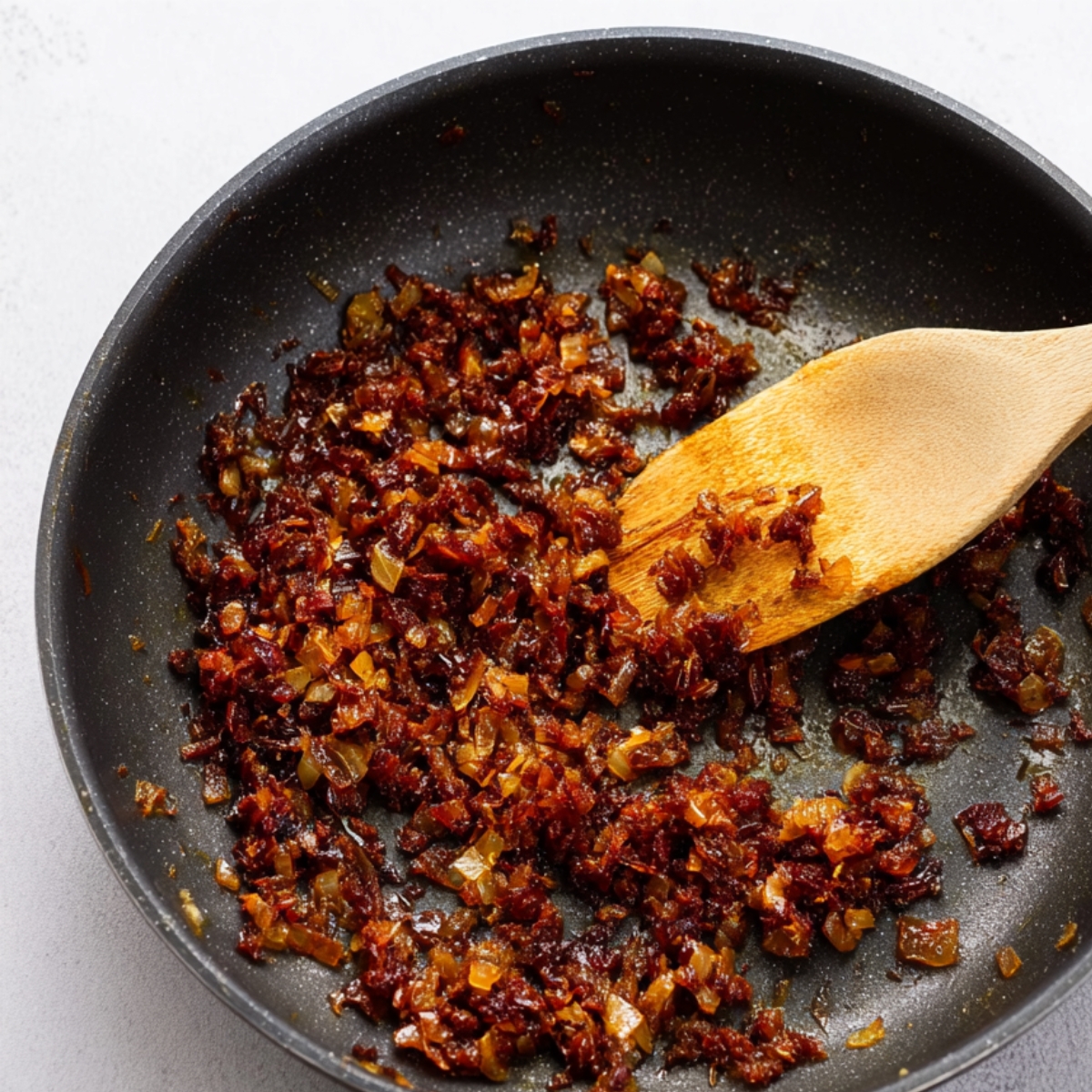 Black bean filling with onions and spices, cooked until rich in color and texture.